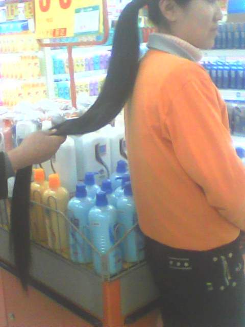 Long ponytail in shop