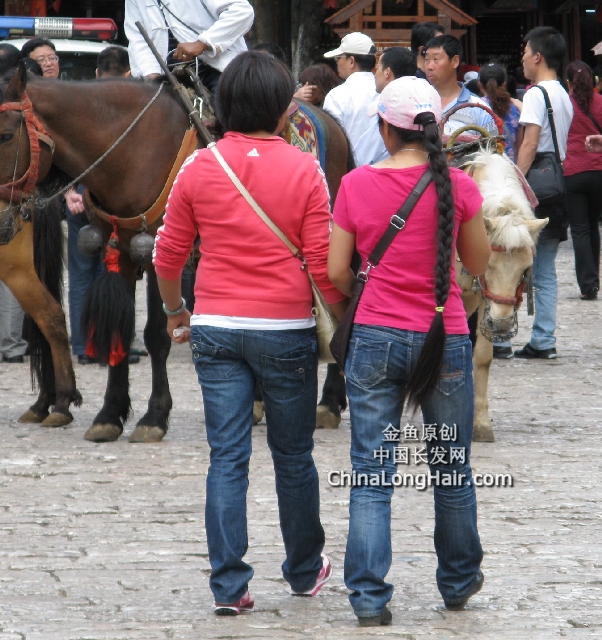 Long braid met in Lijiang city, Yunnan province