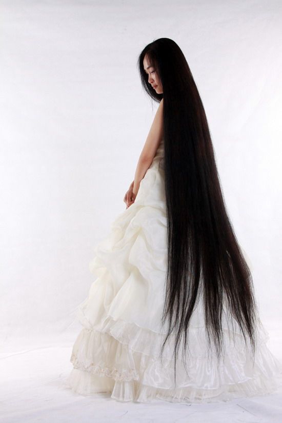 Beautiful girl with floor length long hair