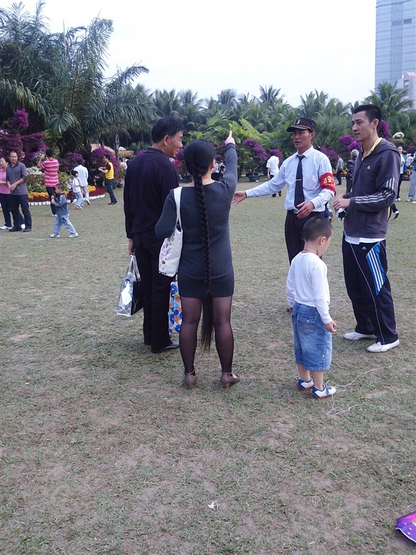 Calf length braid lady in park