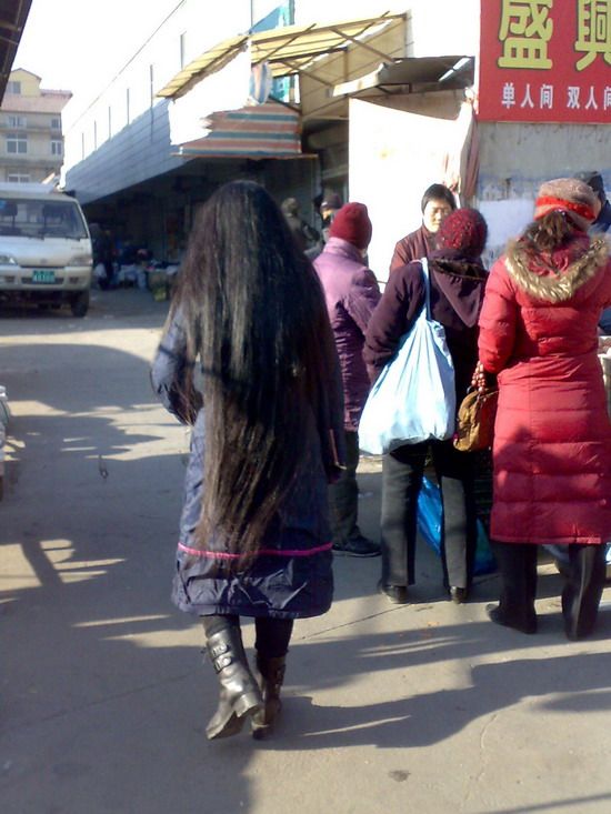 Streetshot of knee length long hair