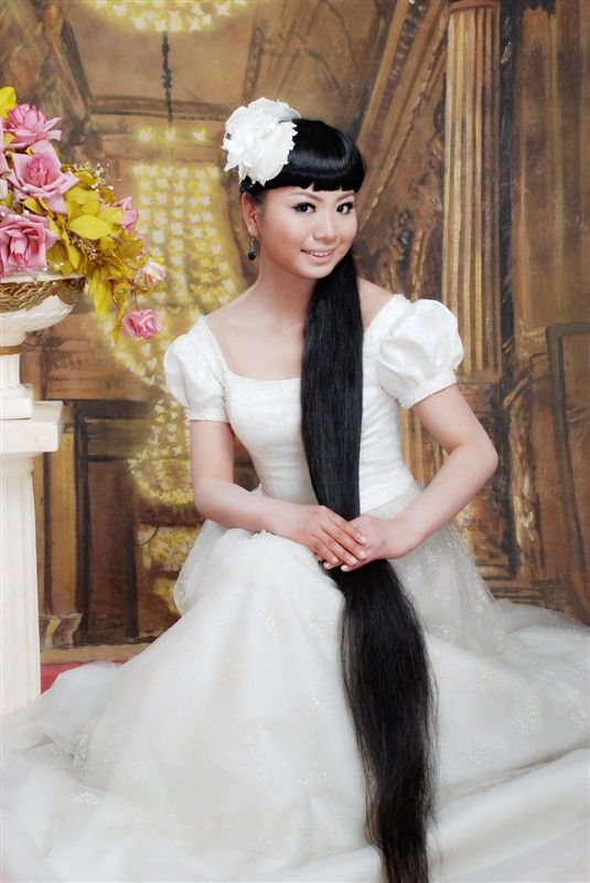 Yan Ying play instrument with long braid