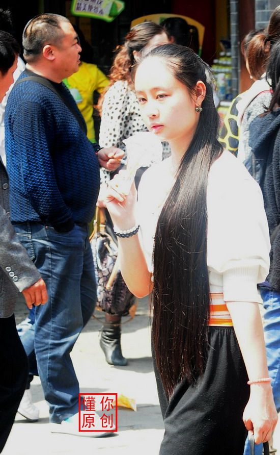 Streetshot of pretty long hair girl by dongni in 2012 April