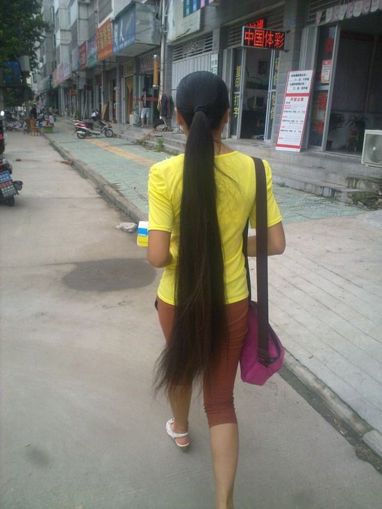 Streetshot of long ponytail by lidunjun