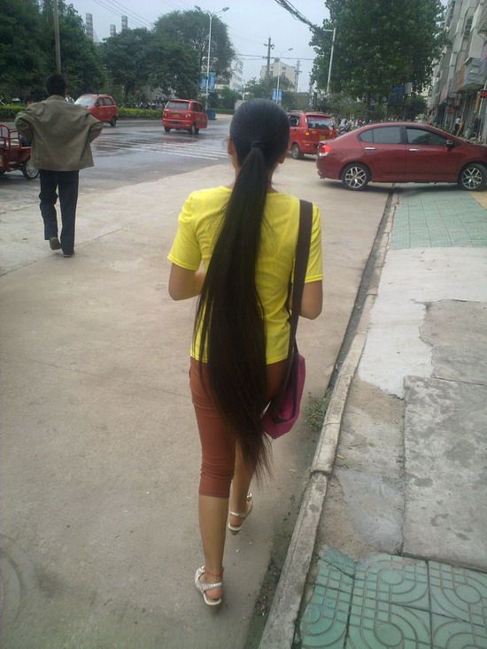 Streetshot of long ponytail by lidunjun