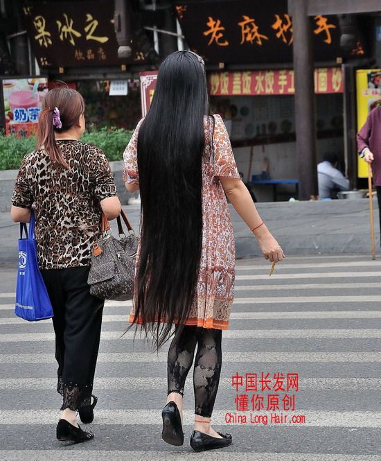 Streetshot of knee length long hair by dongni