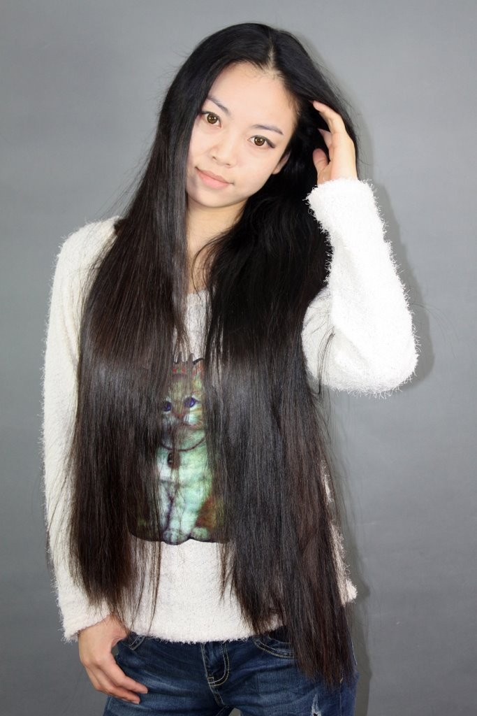 Beautiful girl with hip length long hair