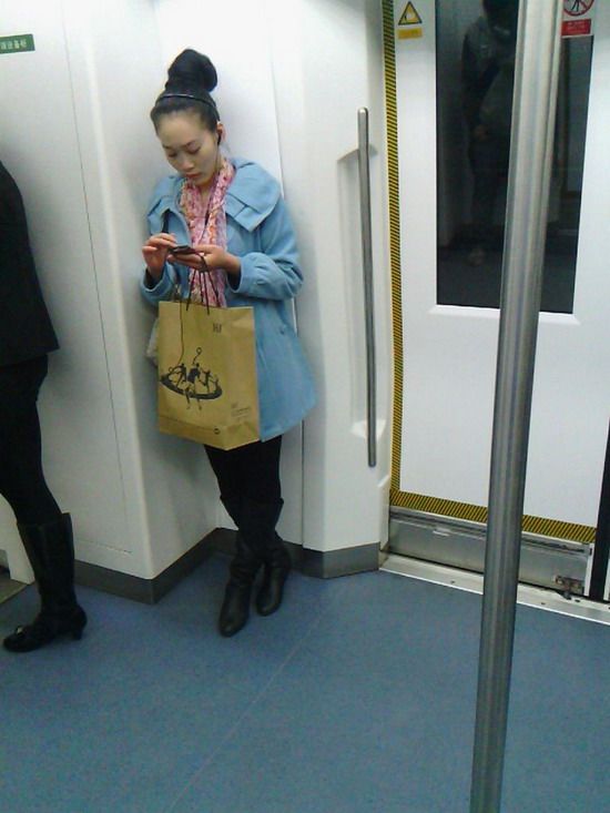 Streetshot of huge bun on Shenzhen subway by 95800