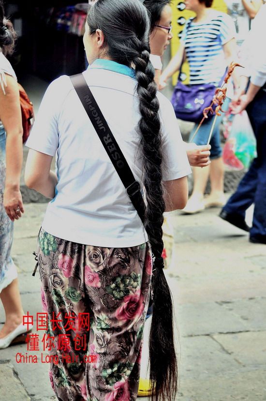 Streetshot of long braid by dongni