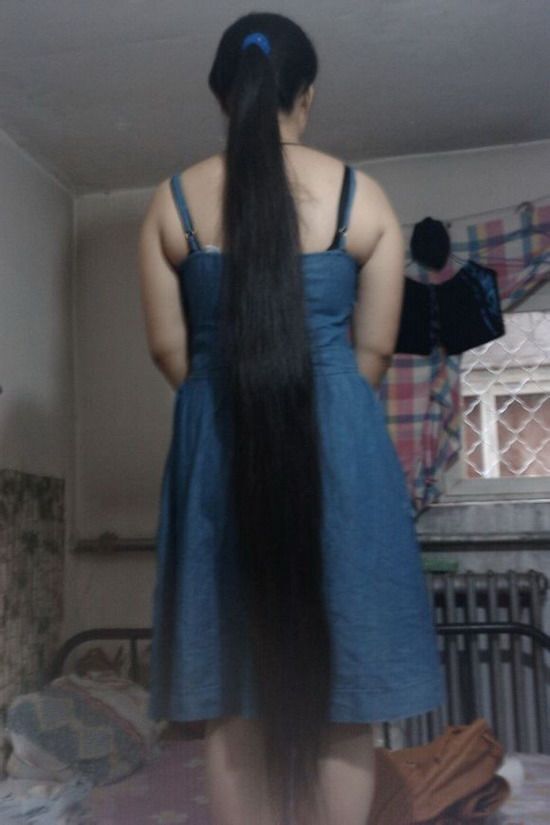 Calf length long ponytail