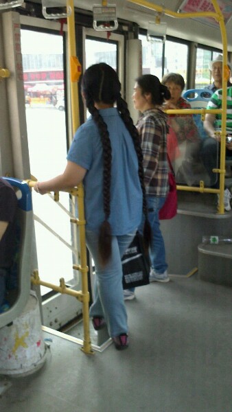 Streetshot of double long hair on bus by aaaaawshj