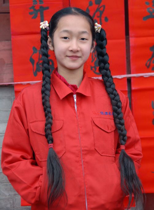 Double braids of long hair girl