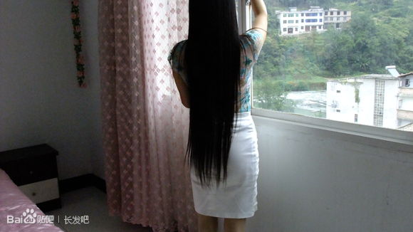 Sexy lady with long hair and thin clothes