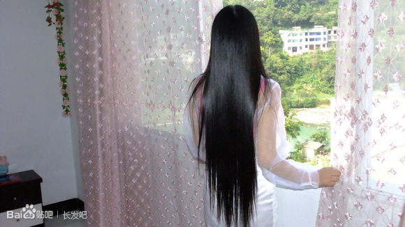 Sexy lady with long hair and thin clothes