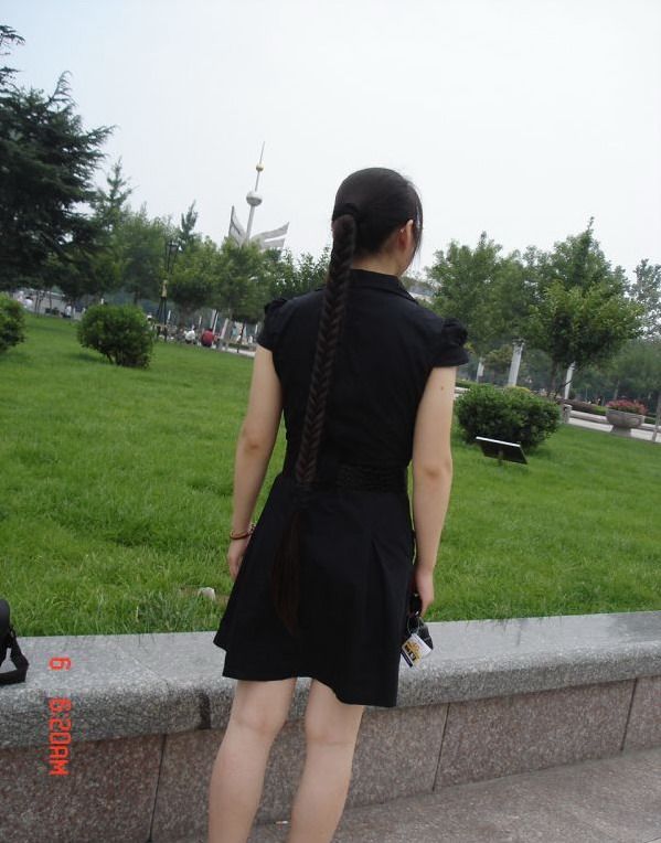 Long hair girl with black braid and black skirt