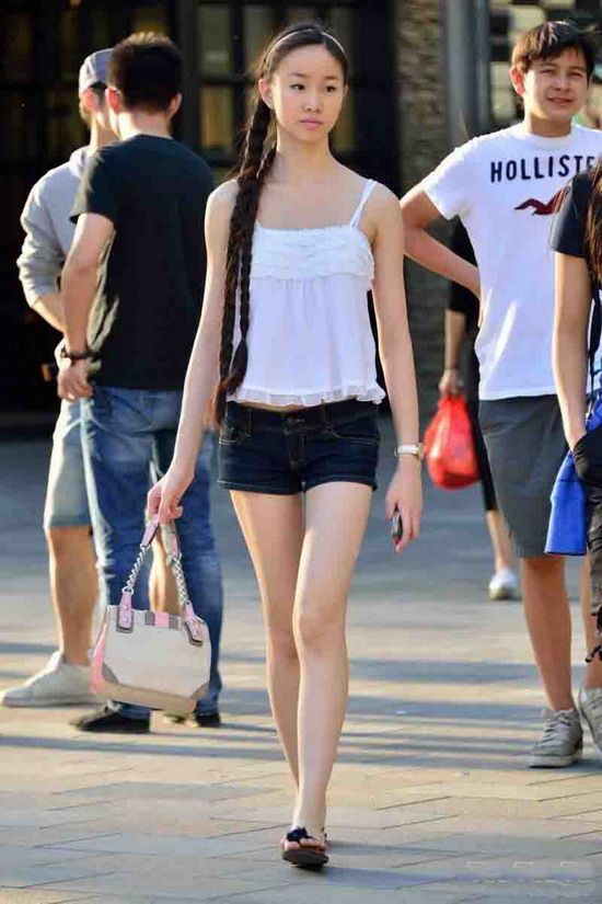 Double braid young girl on street