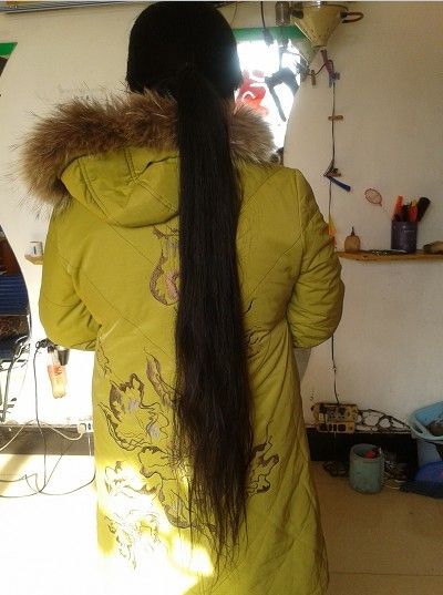 Long hair girl in front of mirror