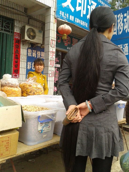 Streetshot of silky long ponytail by zlm