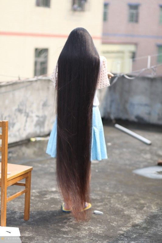 Very beautiful long hair girl on roof