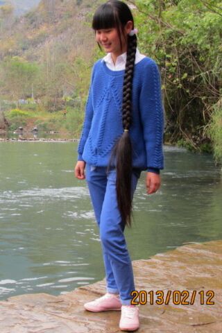 Young girl with amazing long braid