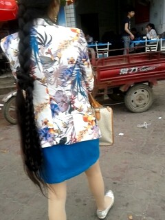 Liu Chun went street with wrapped long braid