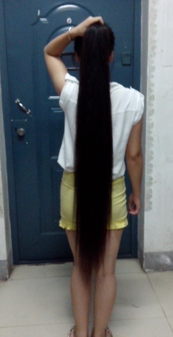 Knee length long ponytail