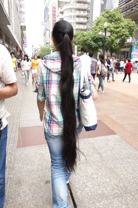 Streetshot of long ponytail by eflikai