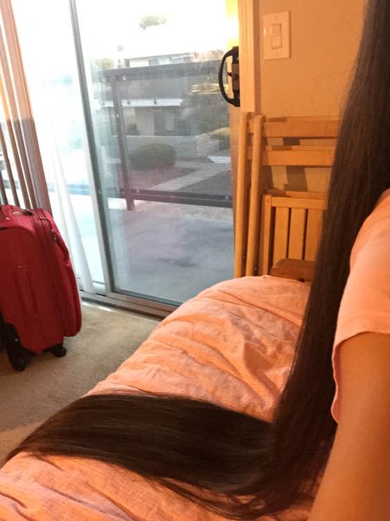 Very long hair lie on bed
