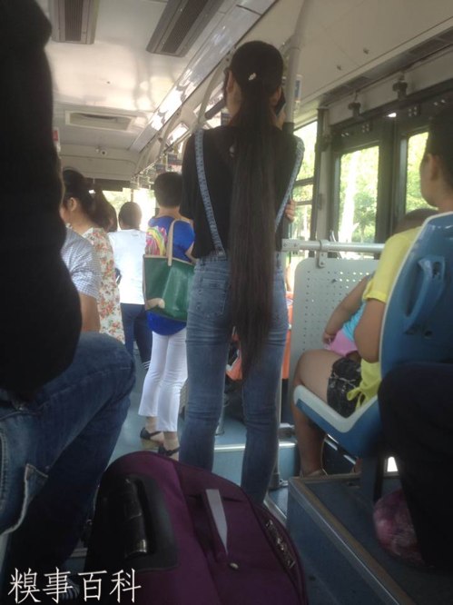 Knee length long hair on bus