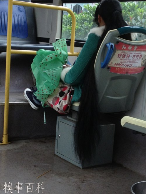 Long hair almost touch floor on bus