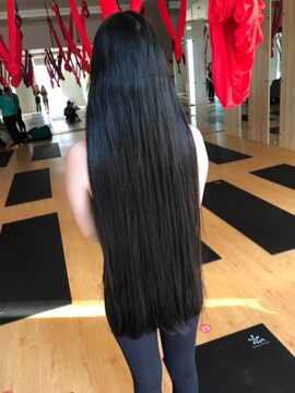 Young girl with hip length long hair