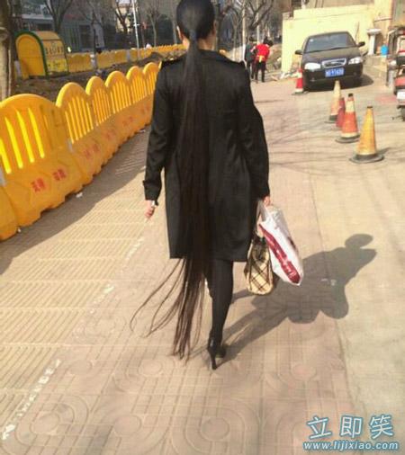 She wears high heels in order not to drag long hair on ground