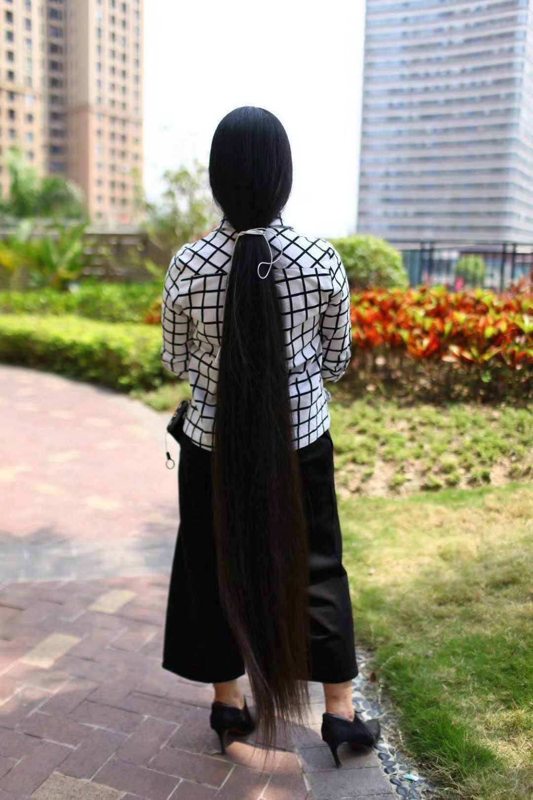Thick floor length long hair made to braid