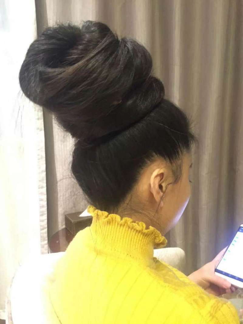 Super long ponytail made to huge bun